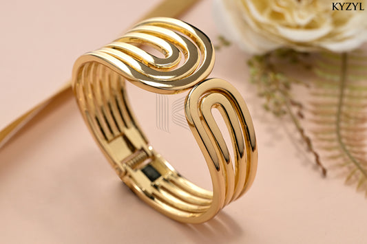 The Triple Swirl Cuff - A Bold Triple-Layered Golden Ribbon