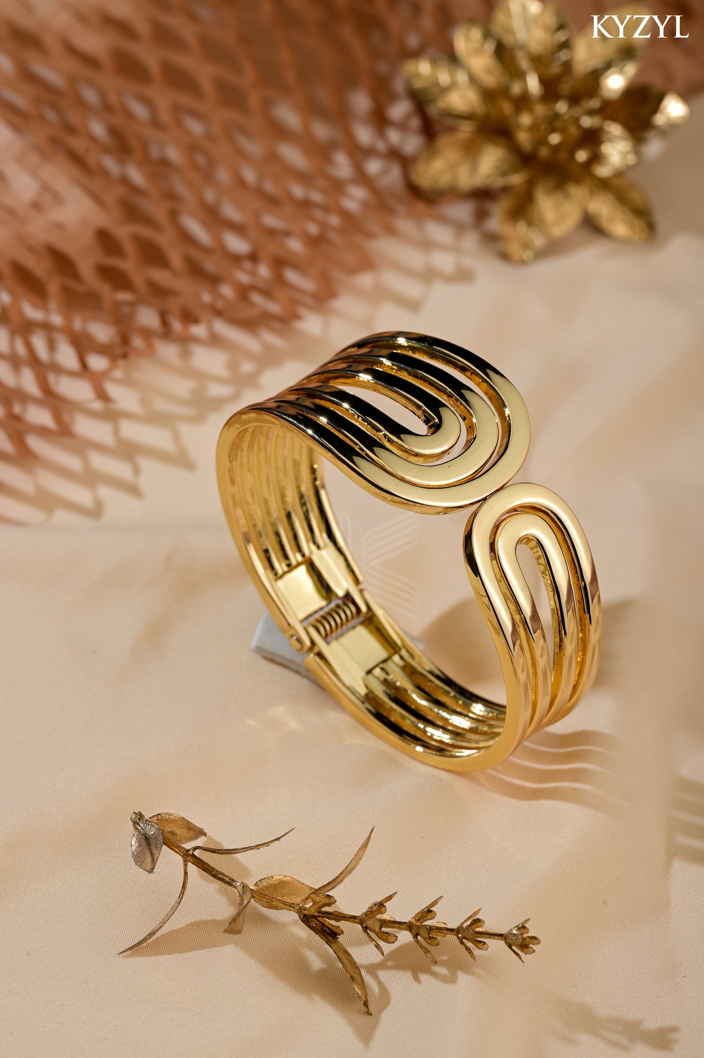 The Triple Swirl Cuff - A Bold Triple-Layered Golden Ribbon